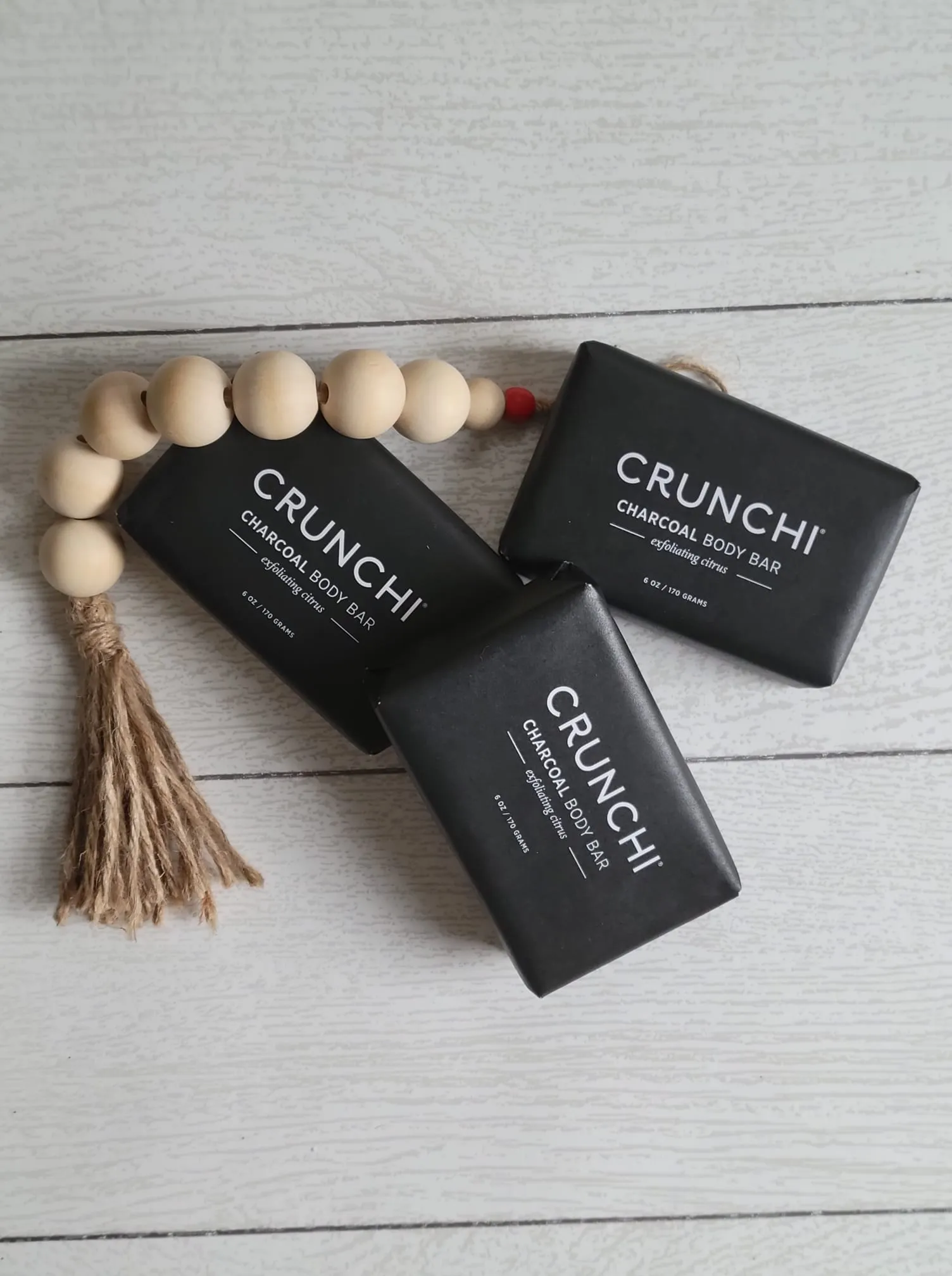 Stack of Crunchi charcoal body bars, my go-to for the whole family